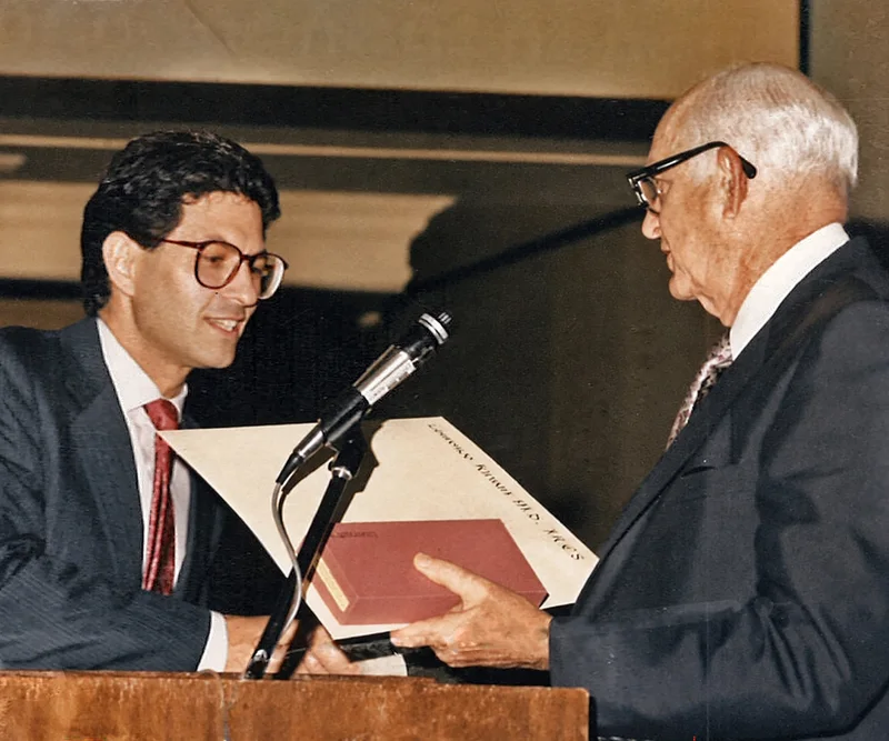 Dr. Kirwan receiving his residency certificate from Dr. McCoy at a ceremony in Kansas City, Missouri