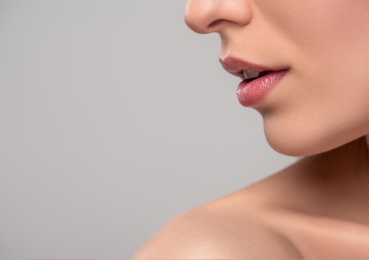 Cropped view of woman with beautiful lips and perfect skin