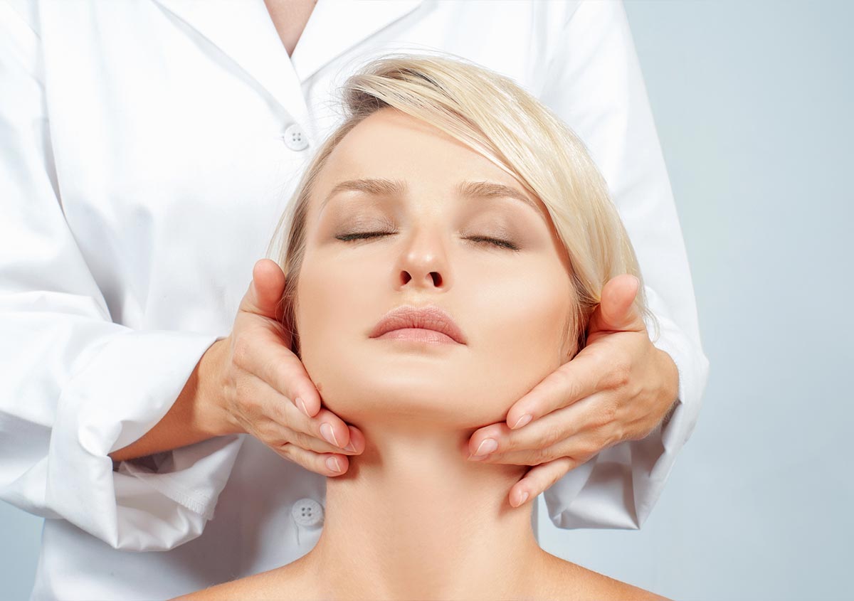 Woman getting her neck examined