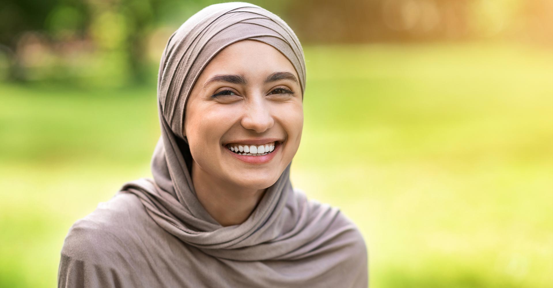 Portrait of pretty smiling young muslim woman